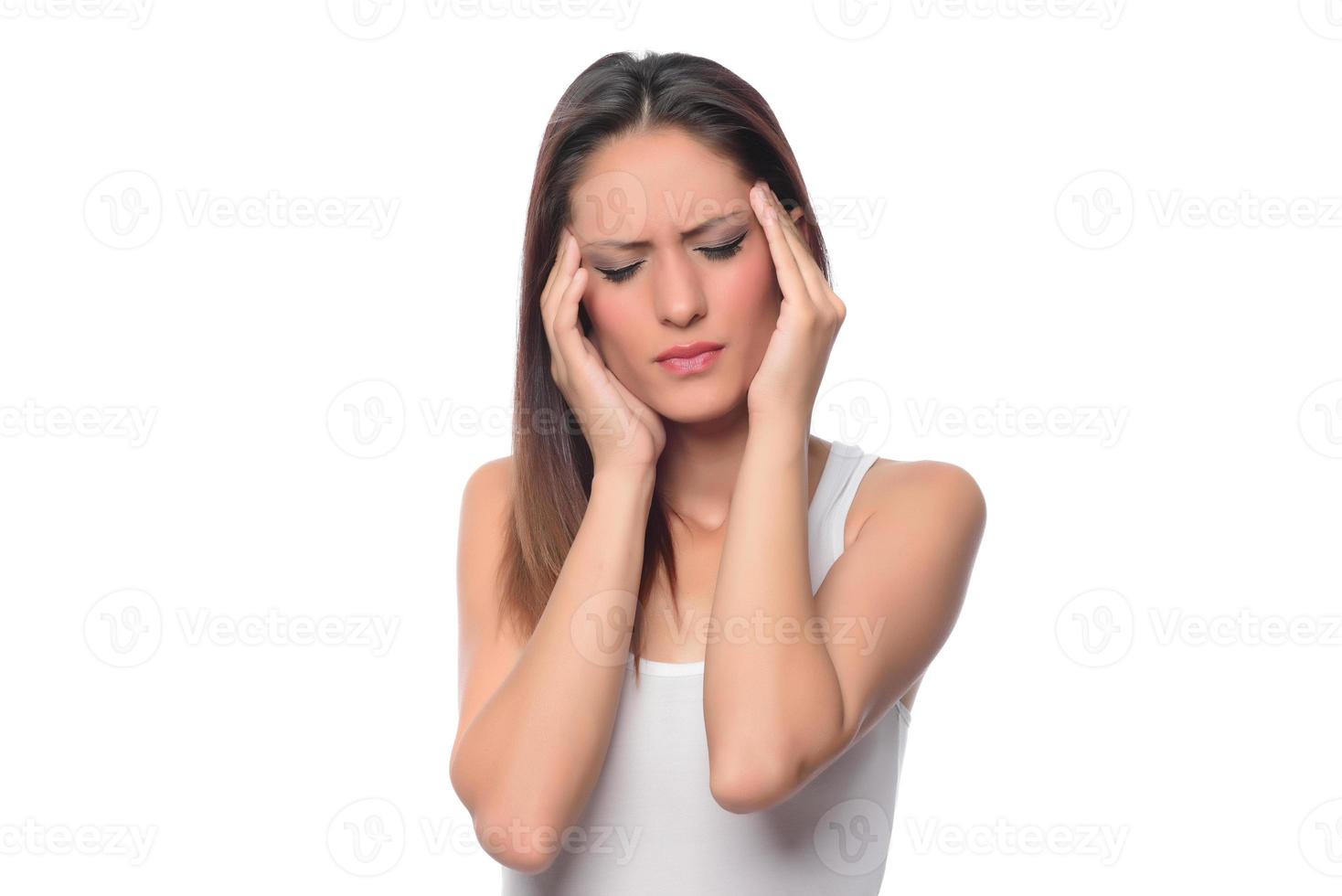 Sad tired young woman touching forehead having headache migraine or depression, upset frustrated girl troubled with problem feel stressed cover crying face with hand suffer from grief sorrow concept photo