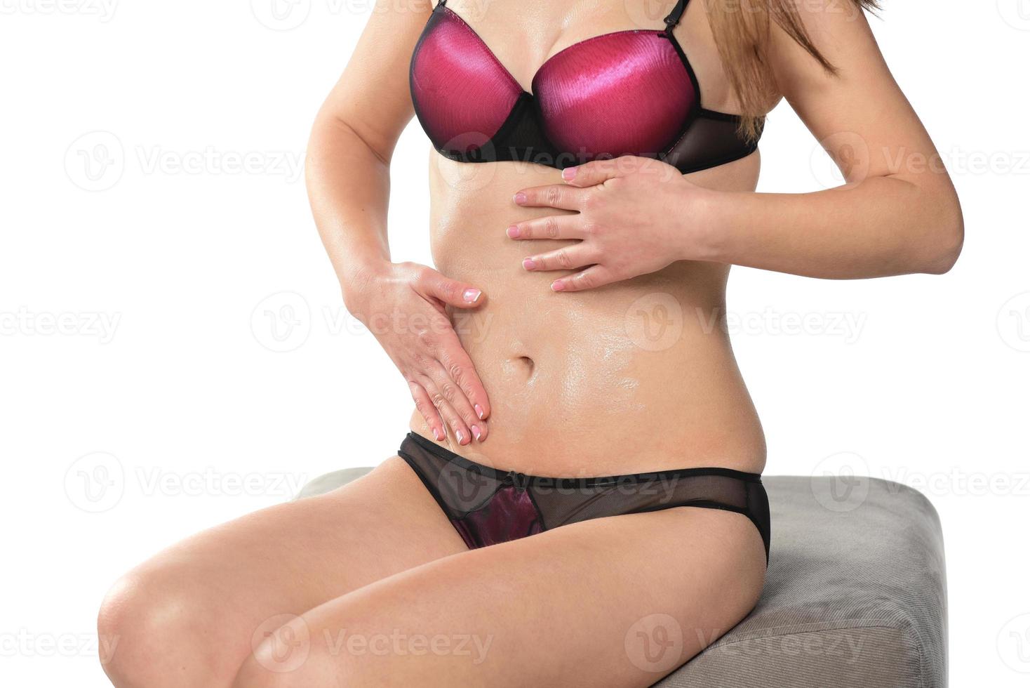 Woman has a stomachache or menstrual pain photo