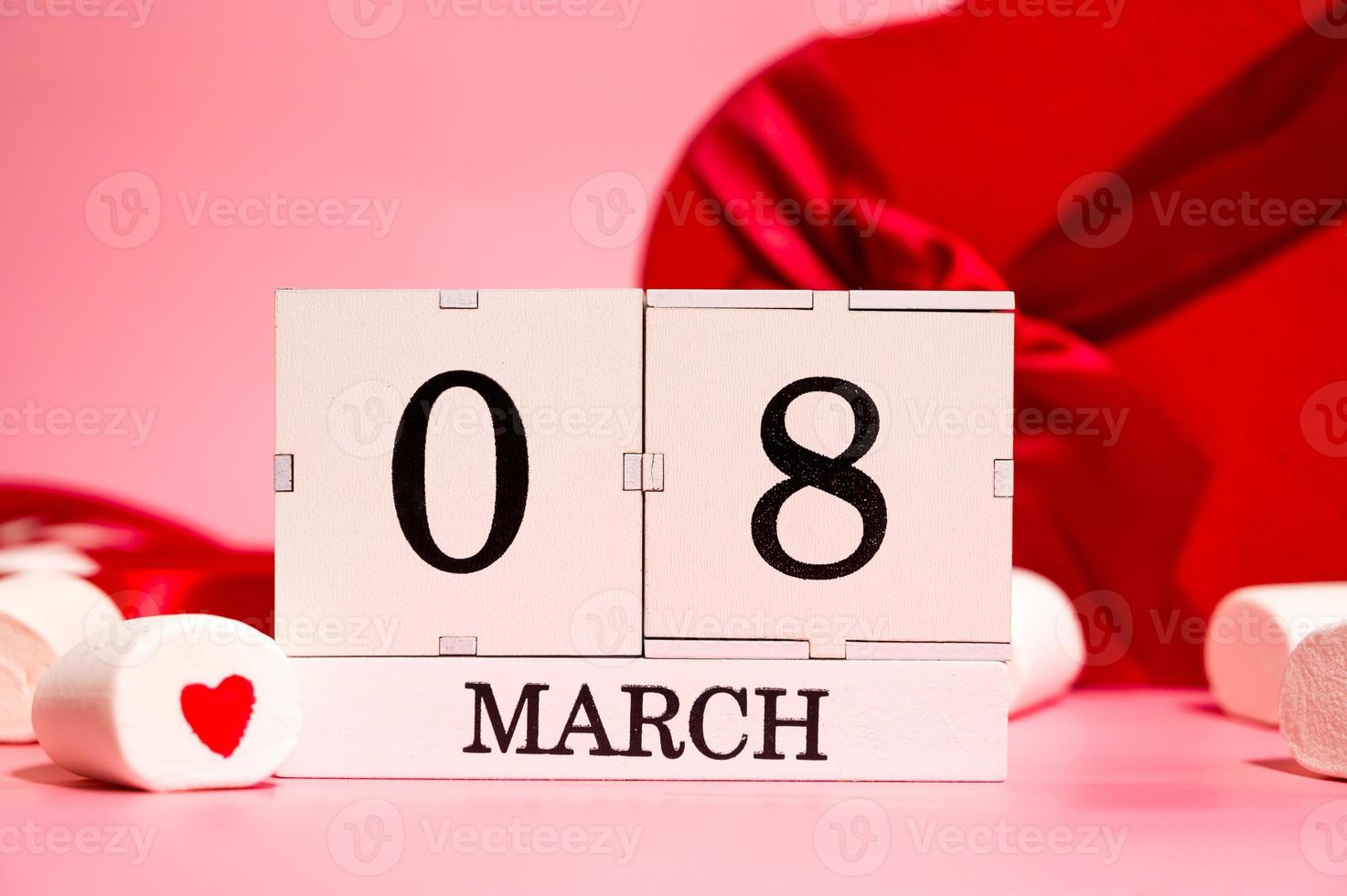 Calendar with 8 march date ,sweets and gifts around.Women's day photo