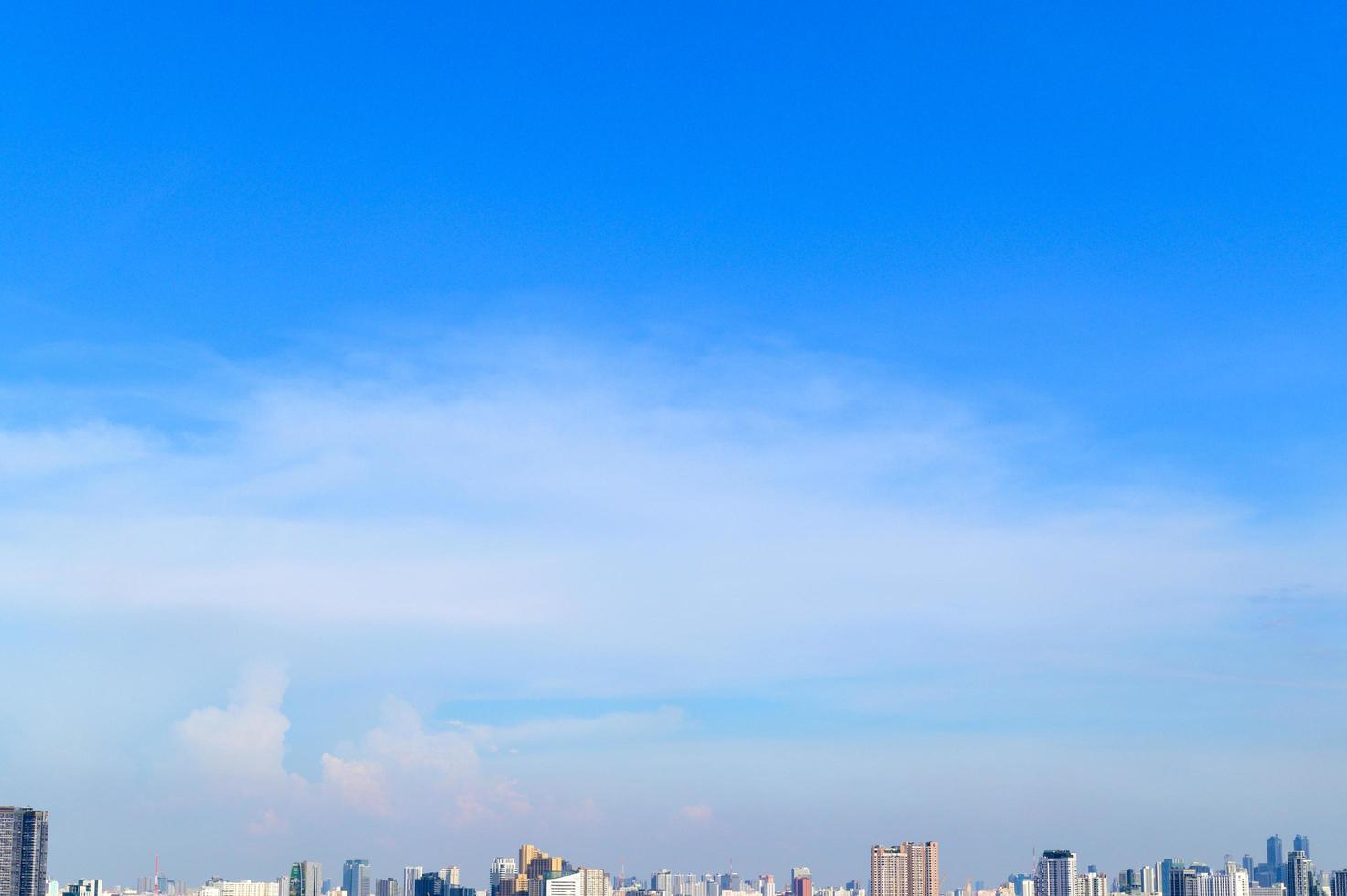 blue sky in summer day over the city photo