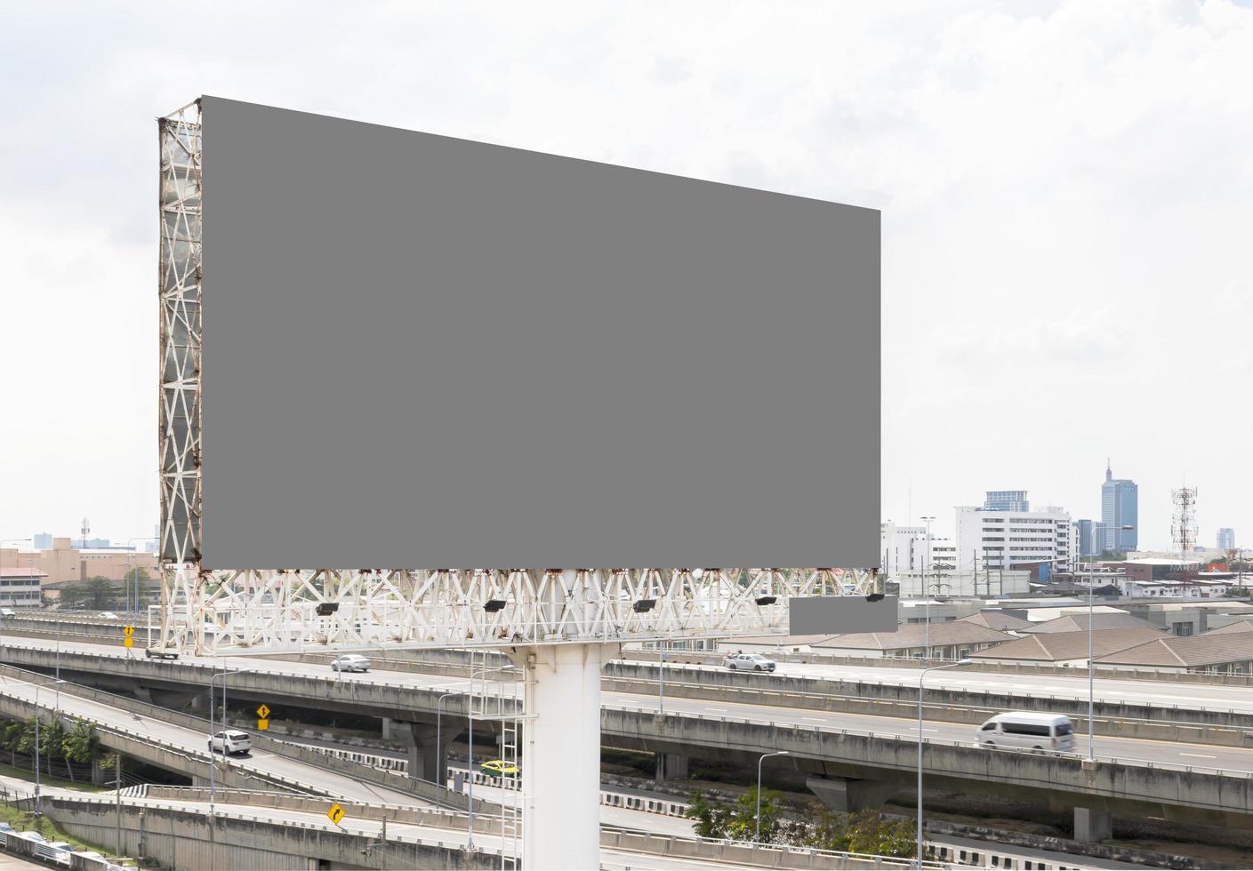 Outdoor pole billboard with mock up gray screen with expressway background. clipping path photo