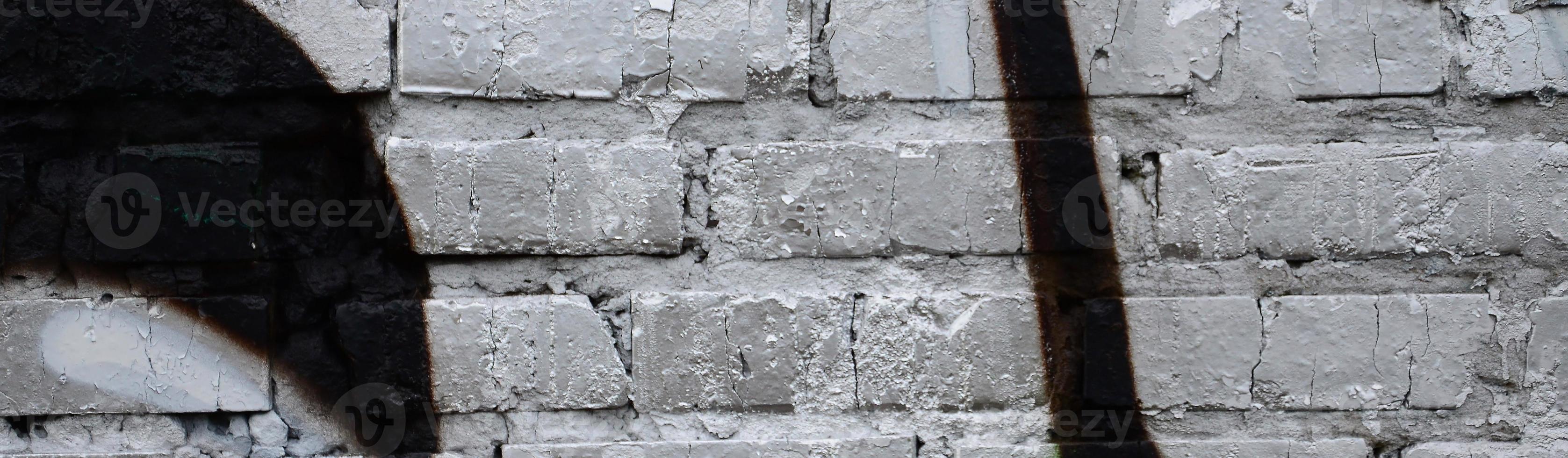 Street art. Abstract background image of a fragment of a colored graffiti painting in chrome and red tones photo