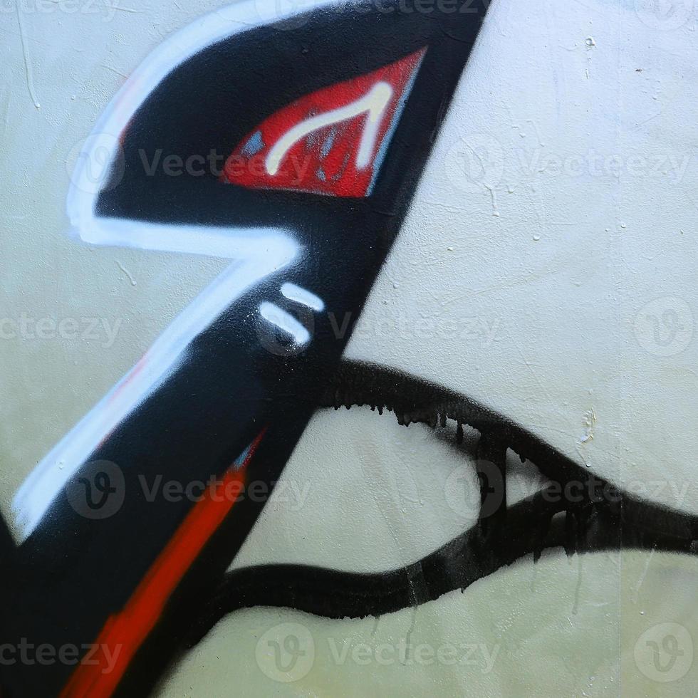 Street art. Abstract background image of a fragment of a colored graffiti painting in chrome and red tones photo