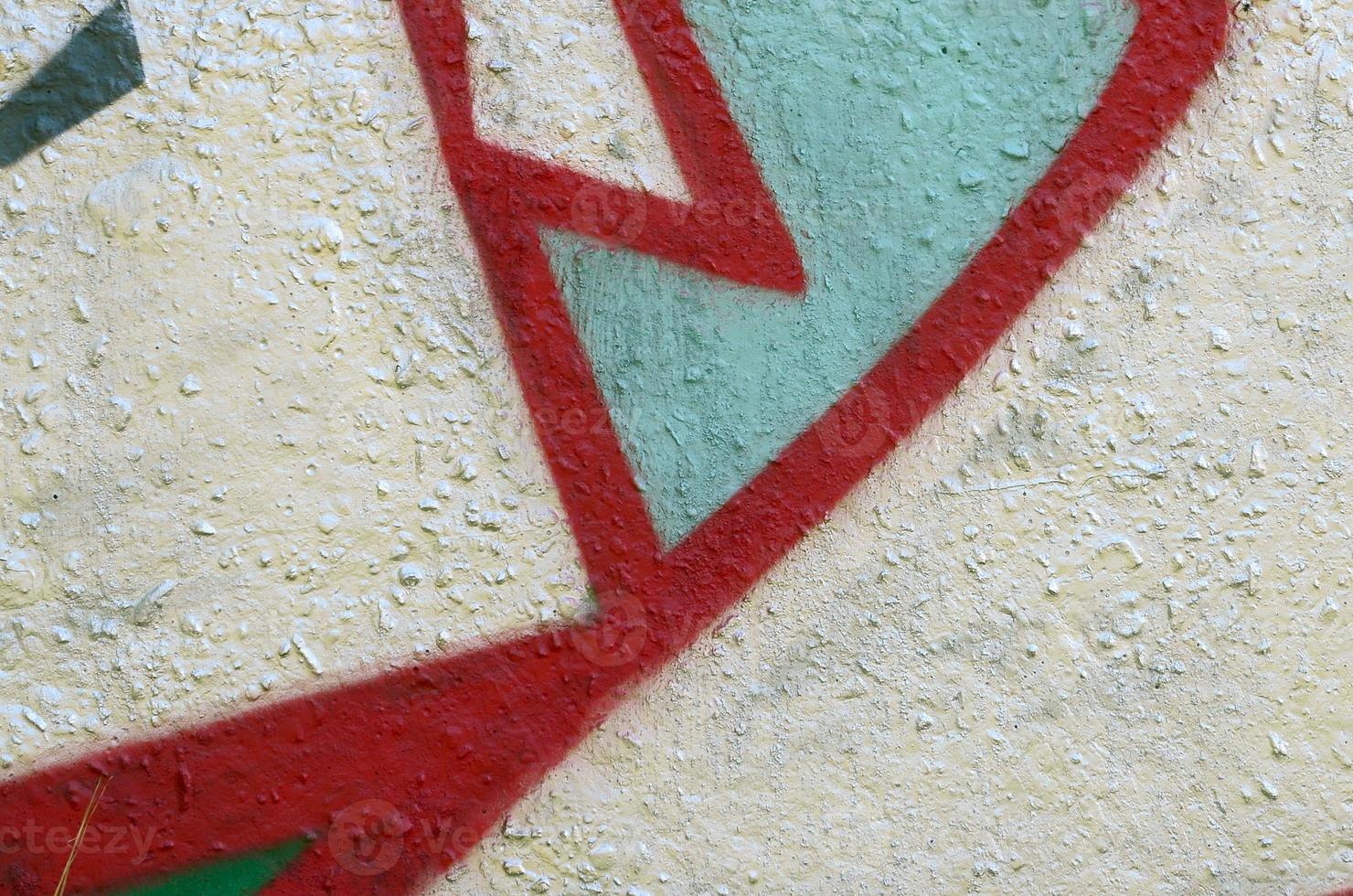 Street art. Abstract background image of a fragment of a colored graffiti painting in chrome and red tones photo