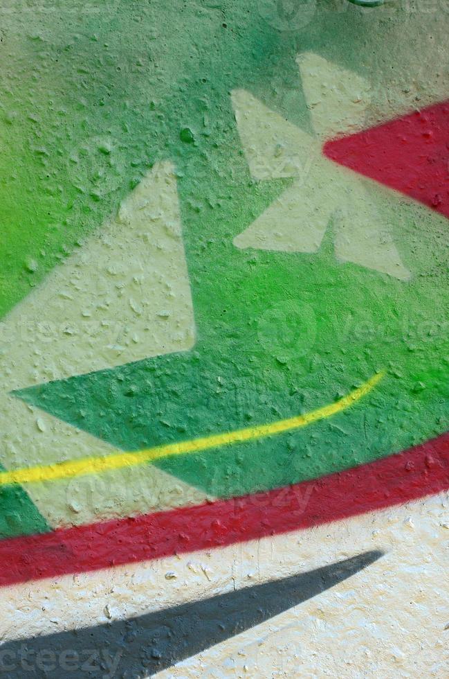 Street art. Abstract background image of a fragment of a colored graffiti painting in chrome and red tones photo