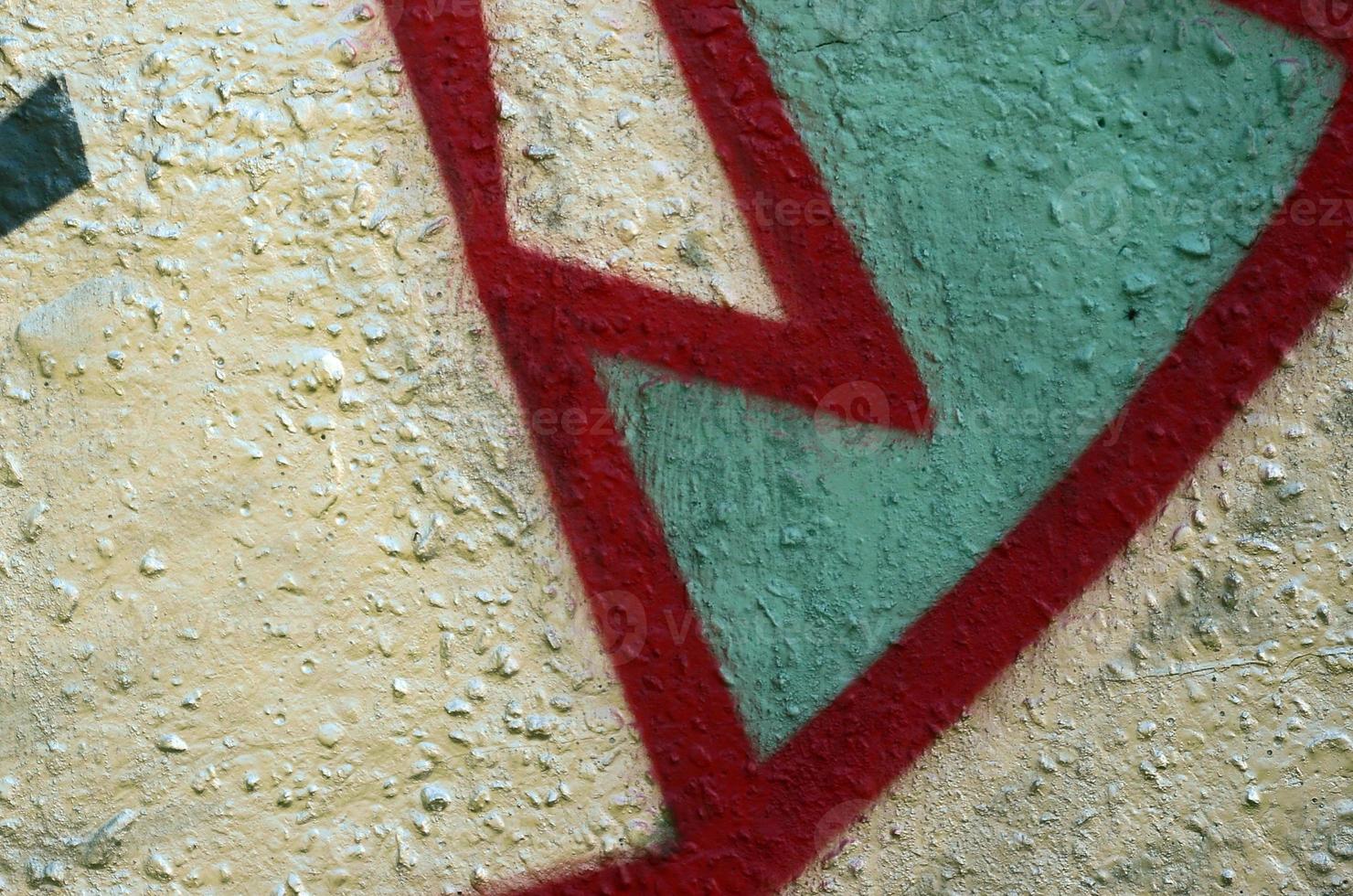 Street art. Abstract background image of a fragment of a colored graffiti painting in chrome and red tones photo