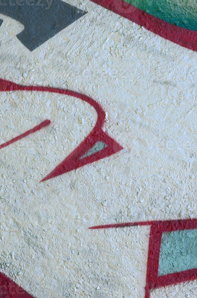 Street art. Abstract background image of a fragment of a colored graffiti painting in chrome and red tones photo