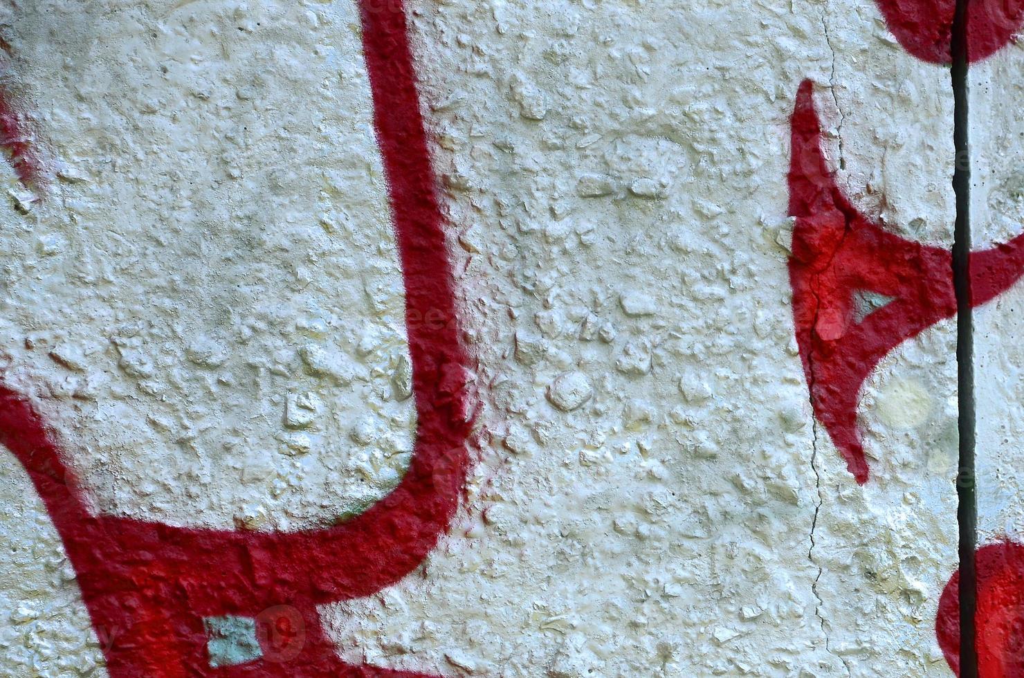 Street art. Abstract background image of a fragment of a colored graffiti painting in chrome and red tones photo