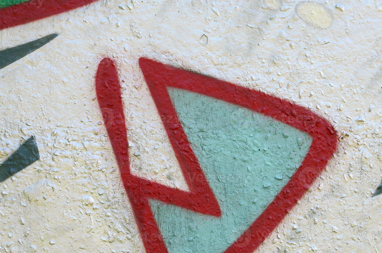 Street art. Abstract background image of a fragment of a colored graffiti painting in chrome and red tones photo