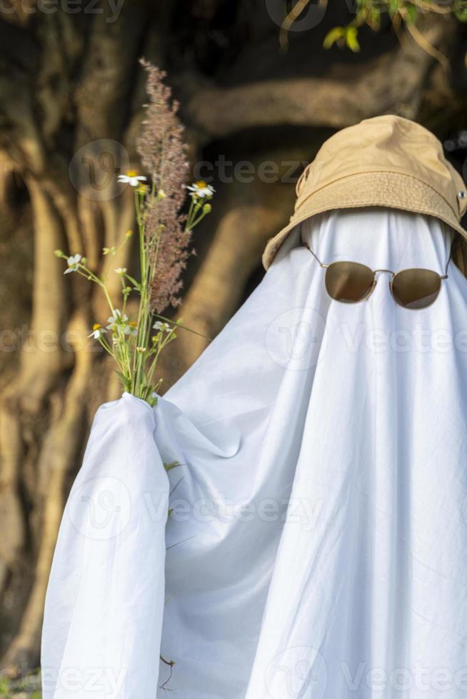 ghost with sparkling hat, ghost with sheet and sunglasses with halloween theme, mexico photo