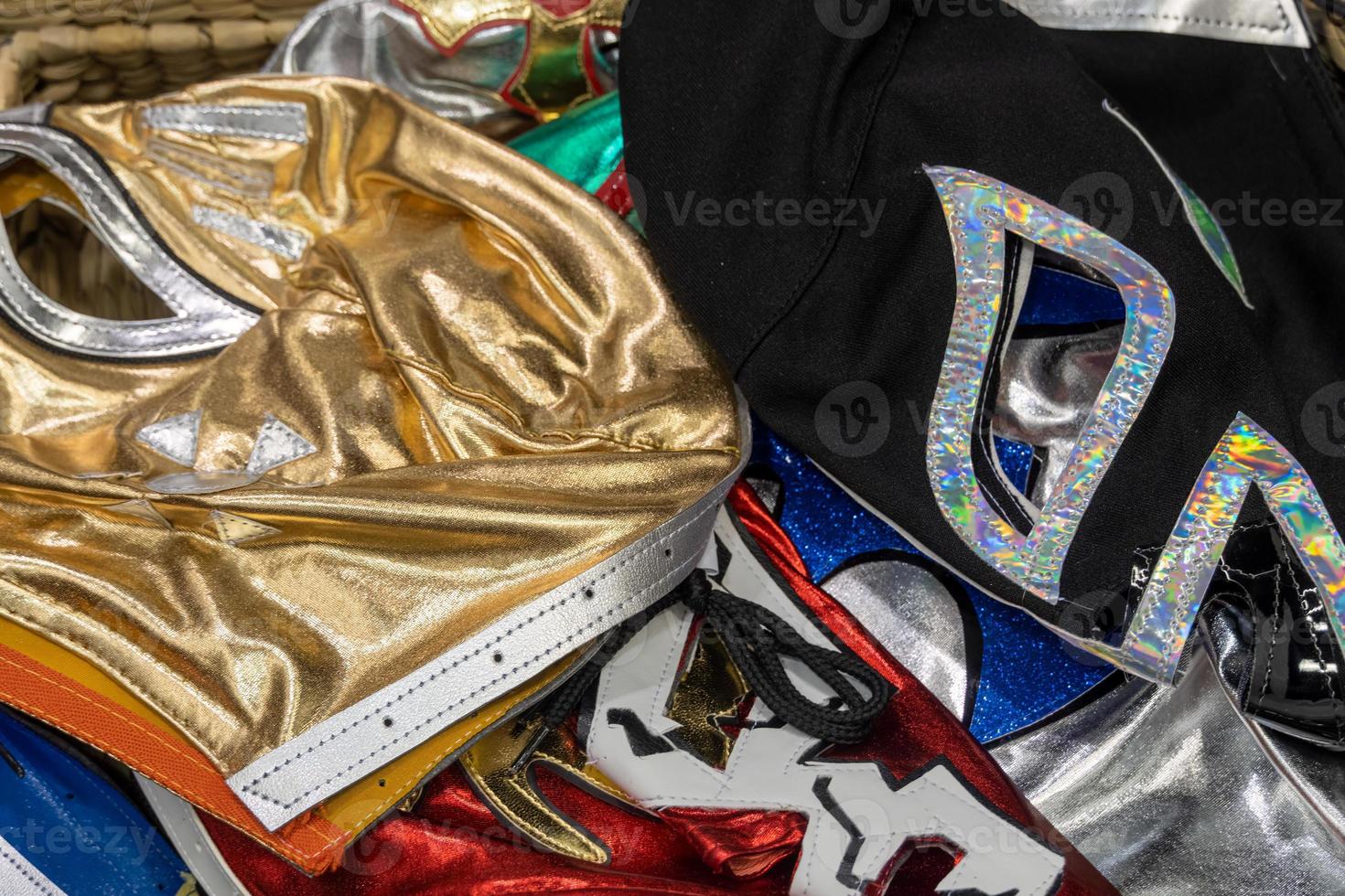 wrestler masks accumulated, traditional mexican sport, mexico , lucha libre, photo