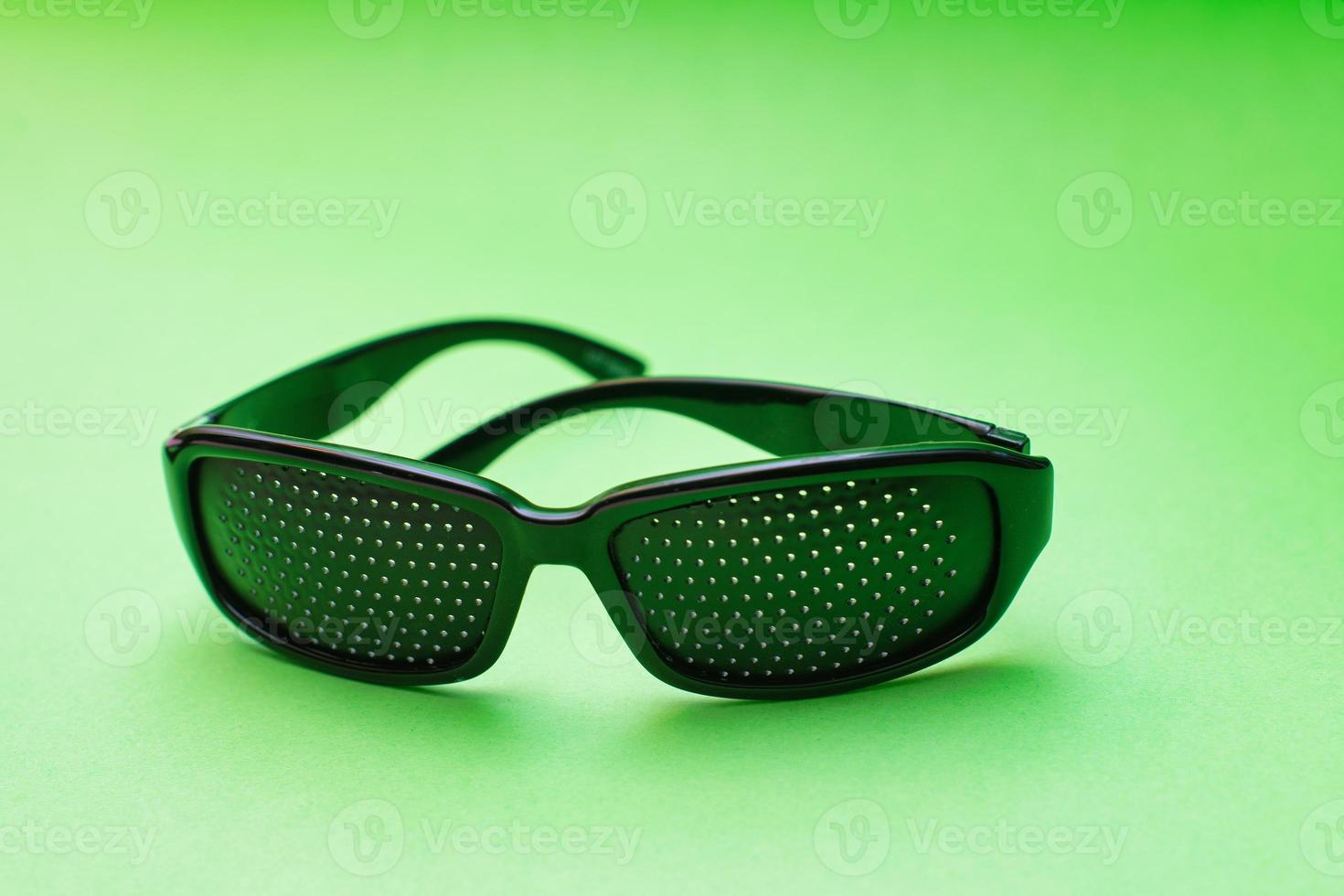 Perforated visual exercise glasses photo