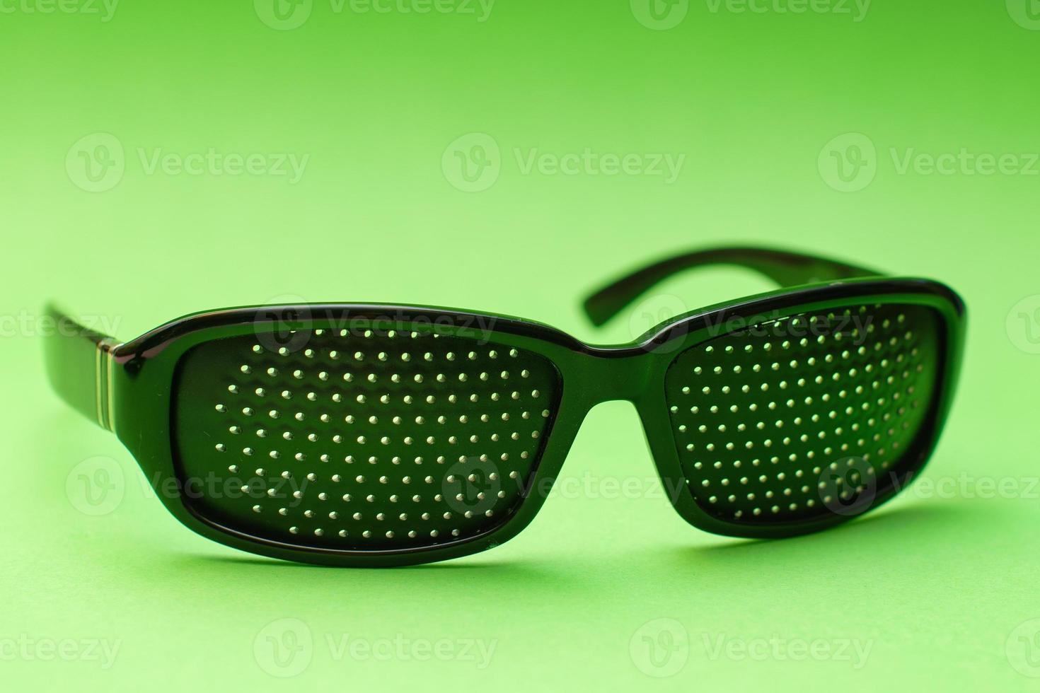 Black perforated medical glasses photo