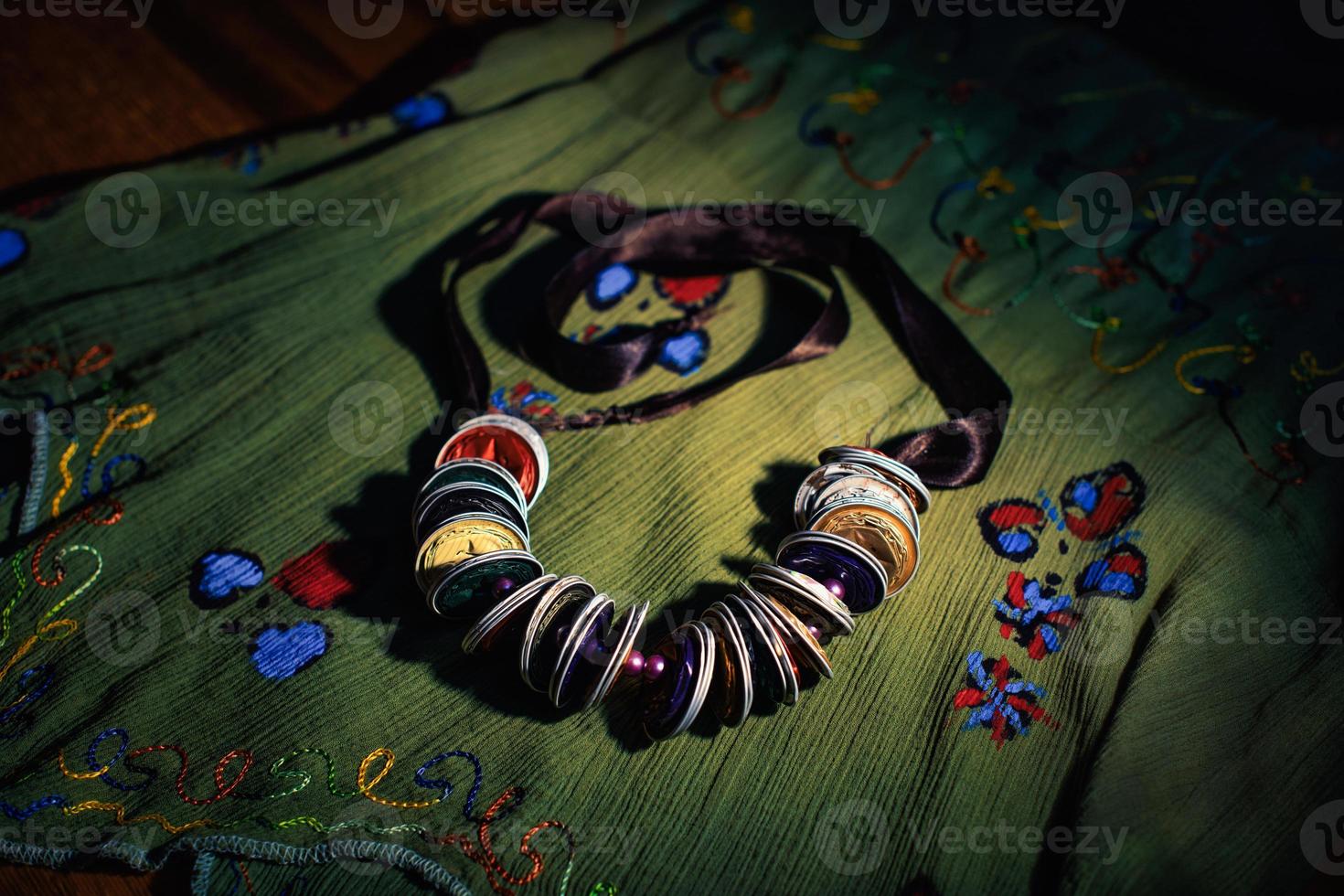 Necklace made from coffee capsules photo