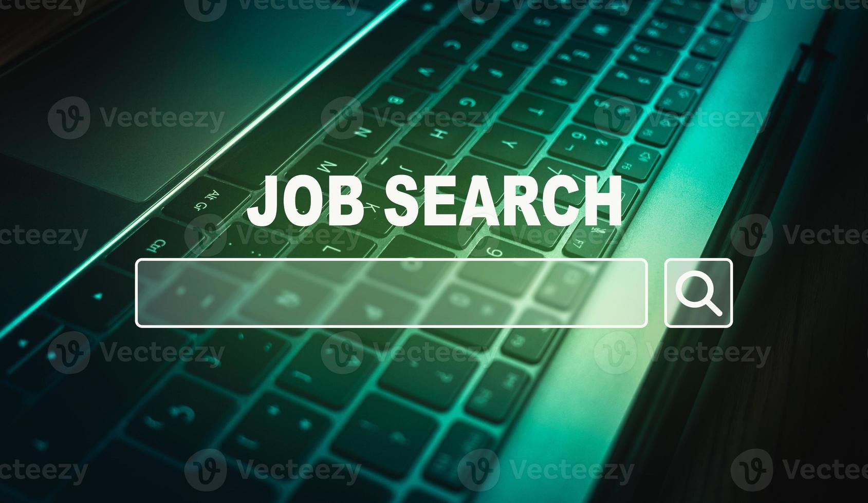 Laptop photo on green tones with VR browser to search a job. Find your career. Using online website to find a job.