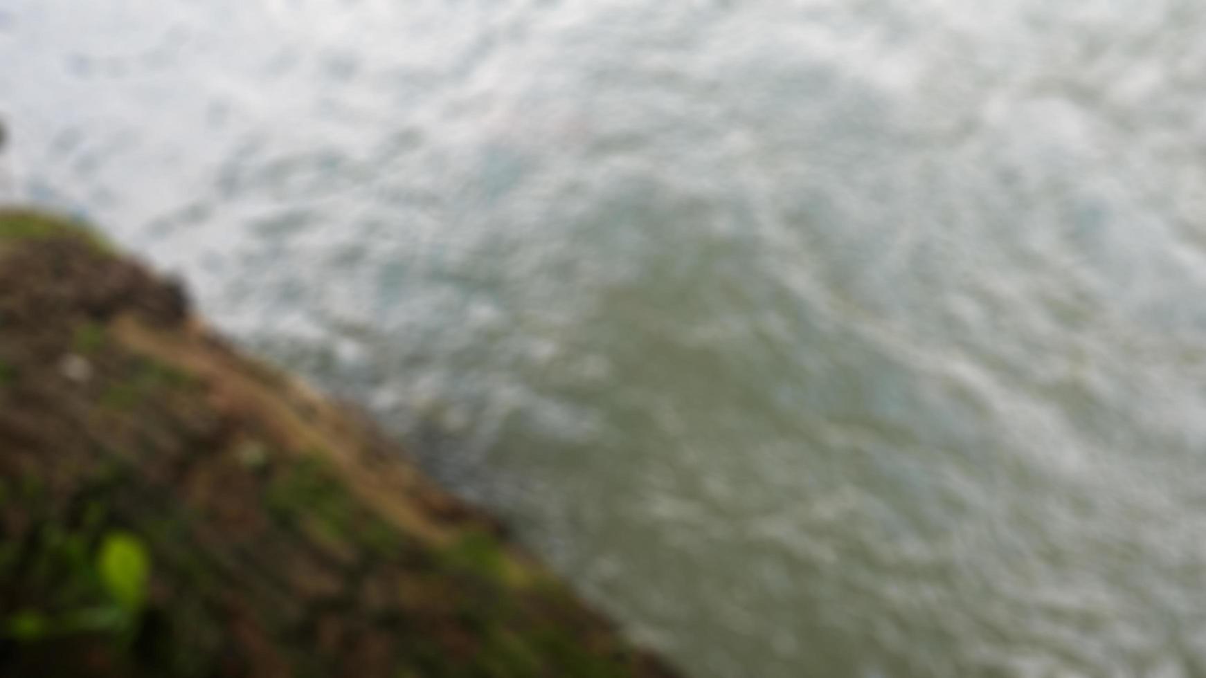 wavy water with bark as background photo