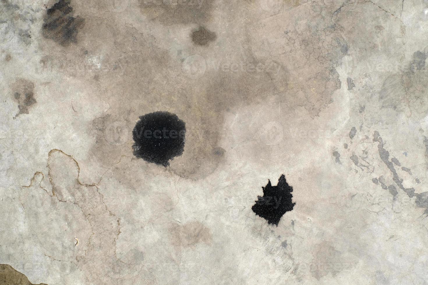 Car oil stains dripping onto cement floor, car engine oil, cement floor, dirt, old, top view, photo