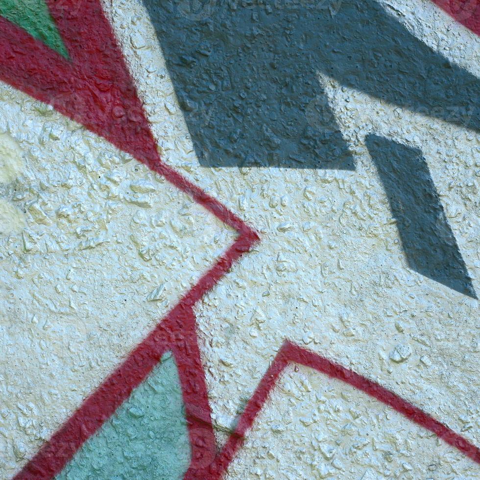 Street art. Abstract background image of a fragment of a colored graffiti painting in chrome and red tones photo