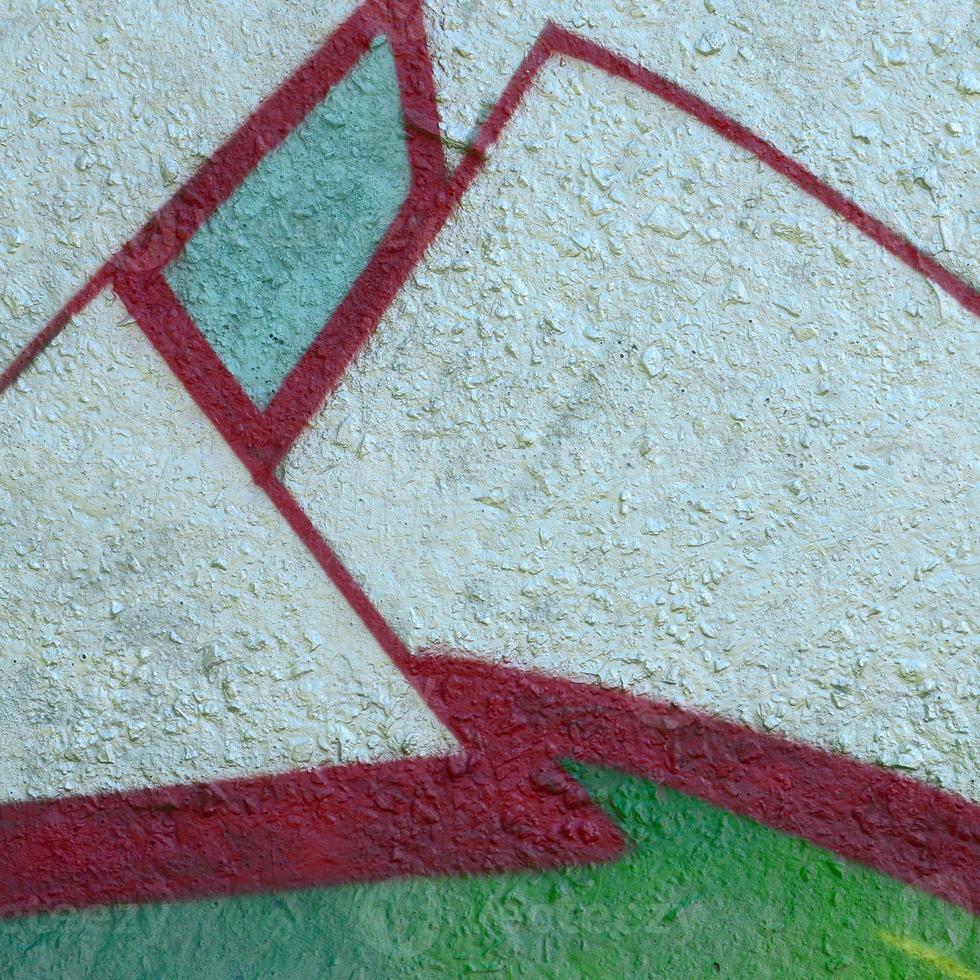 Street art. Abstract background image of a fragment of a colored graffiti painting in chrome and red tones photo