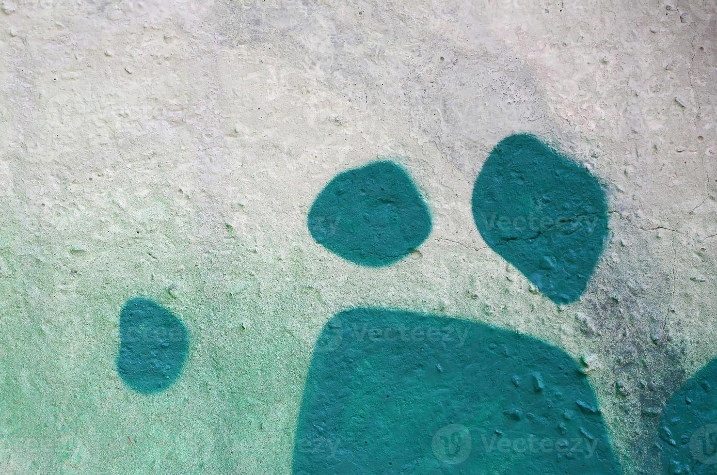 Street art. Abstract background image of a fragment of a colored graffiti painting in khaki green and orange tones photo