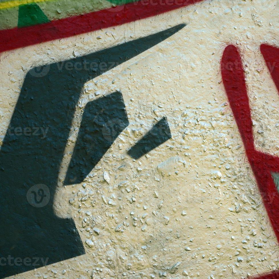 Street art. Abstract background image of a fragment of a colored graffiti painting in chrome and red tones photo