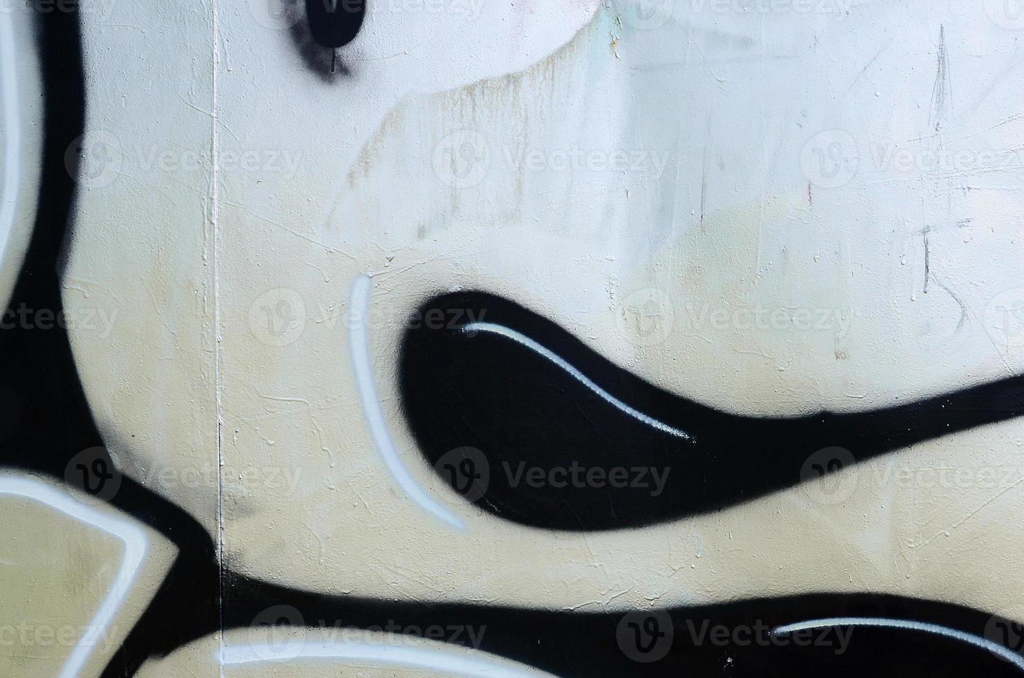 Street art. Abstract background image of a fragment of a colored graffiti painting in chrome and red tones photo