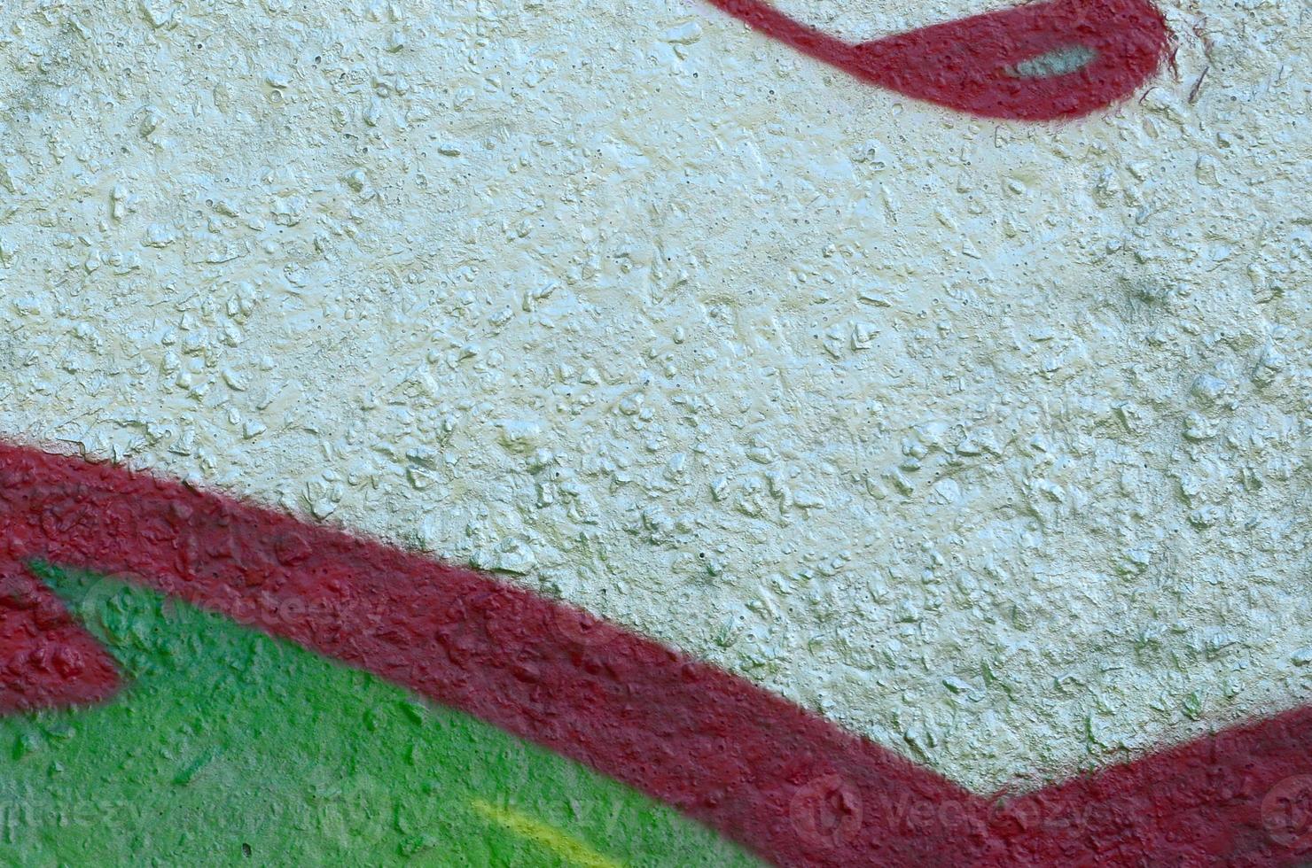 Street art. Abstract background image of a fragment of a colored graffiti painting in chrome and red tones photo