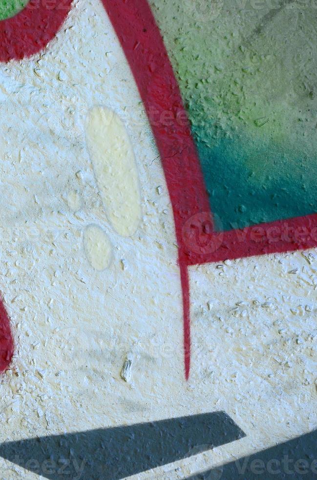 Street art. Abstract background image of a fragment of a colored graffiti painting in chrome and red tones photo