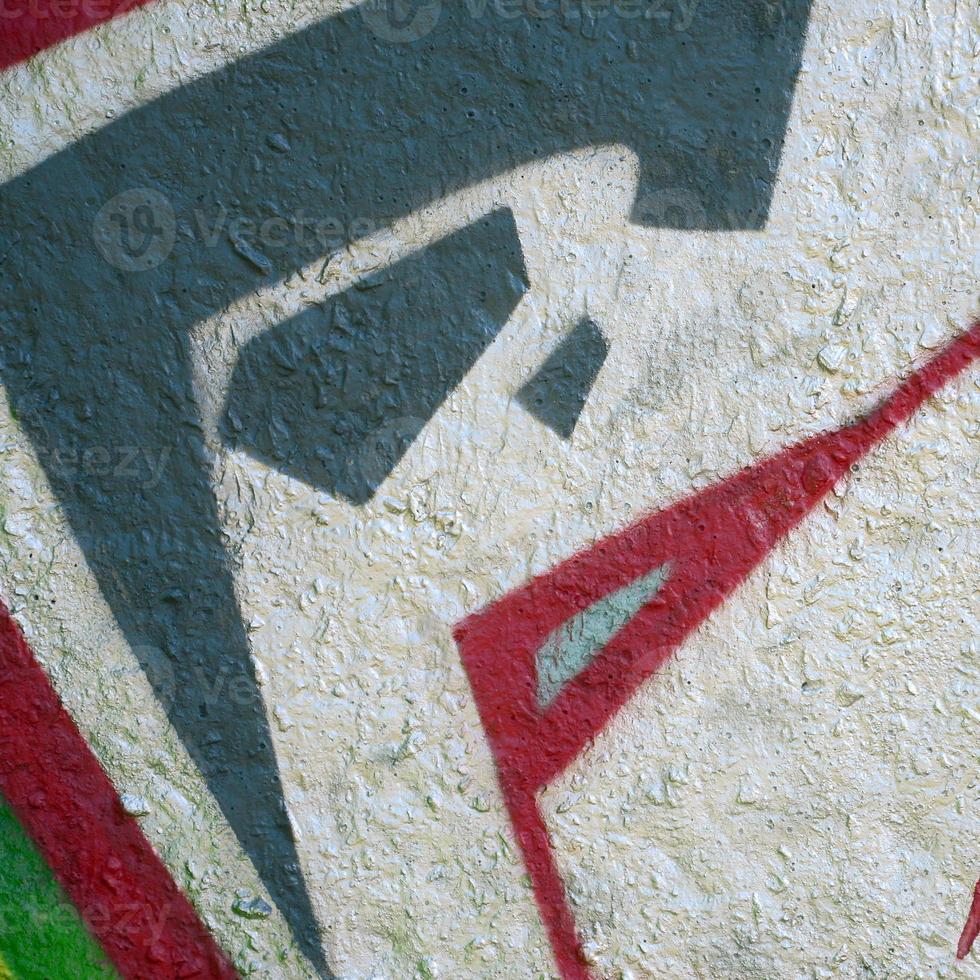 Street art. Abstract background image of a fragment of a colored graffiti painting in chrome and red tones photo