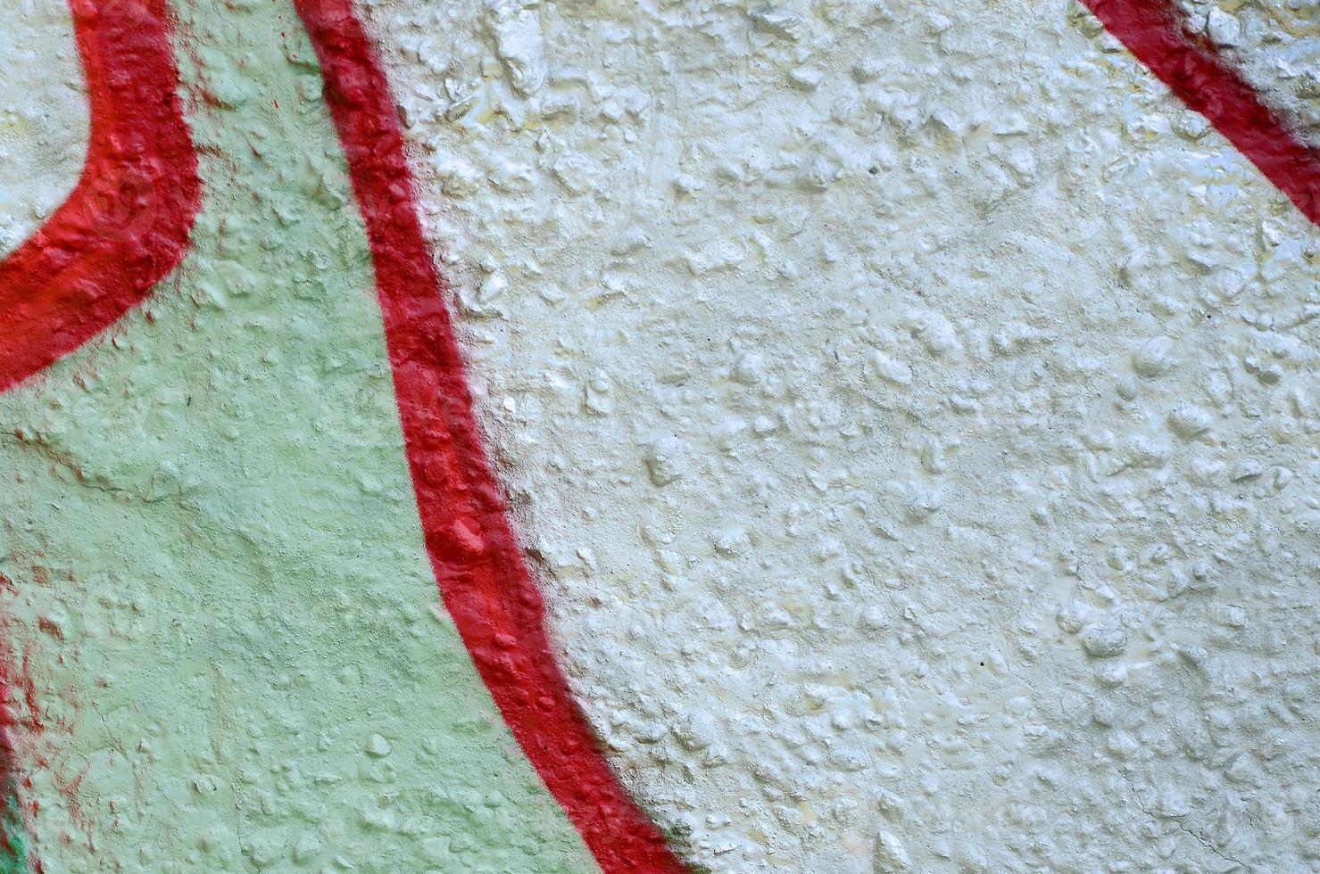 Street art. Abstract background image of a fragment of a colored graffiti painting in chrome and red tones photo