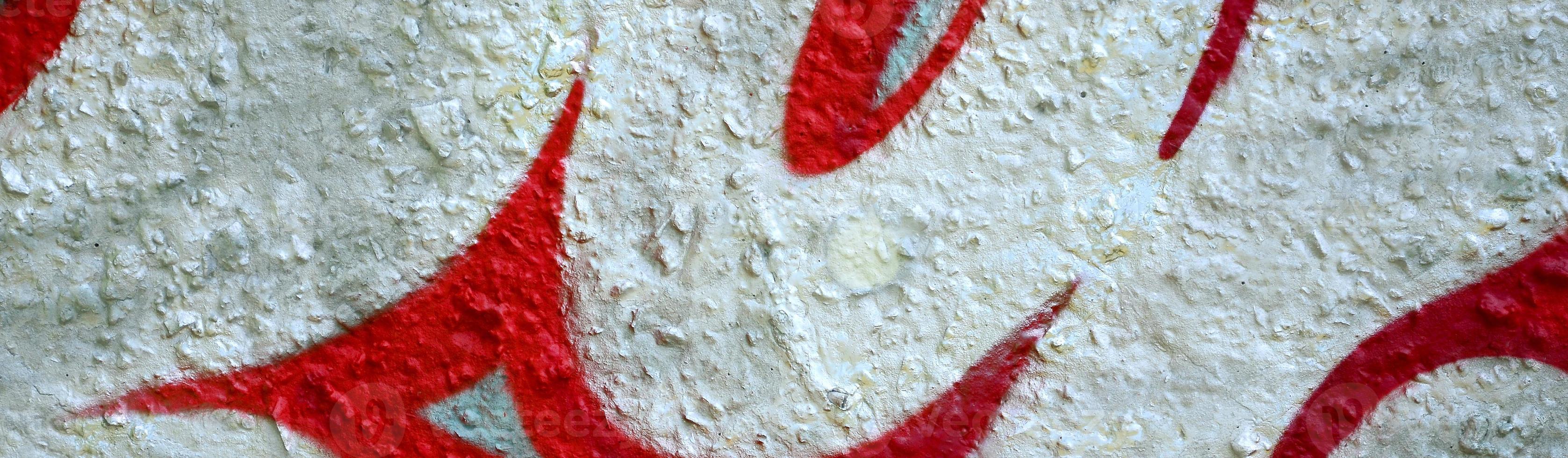 Street art. Abstract background image of a fragment of a colored graffiti painting in chrome and red tones photo