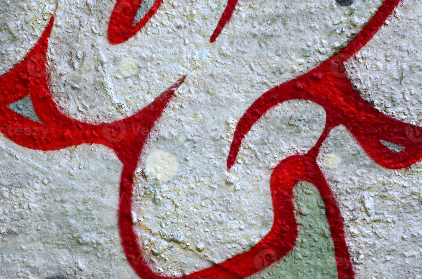 Street art. Abstract background image of a fragment of a colored graffiti painting in chrome and red tones photo