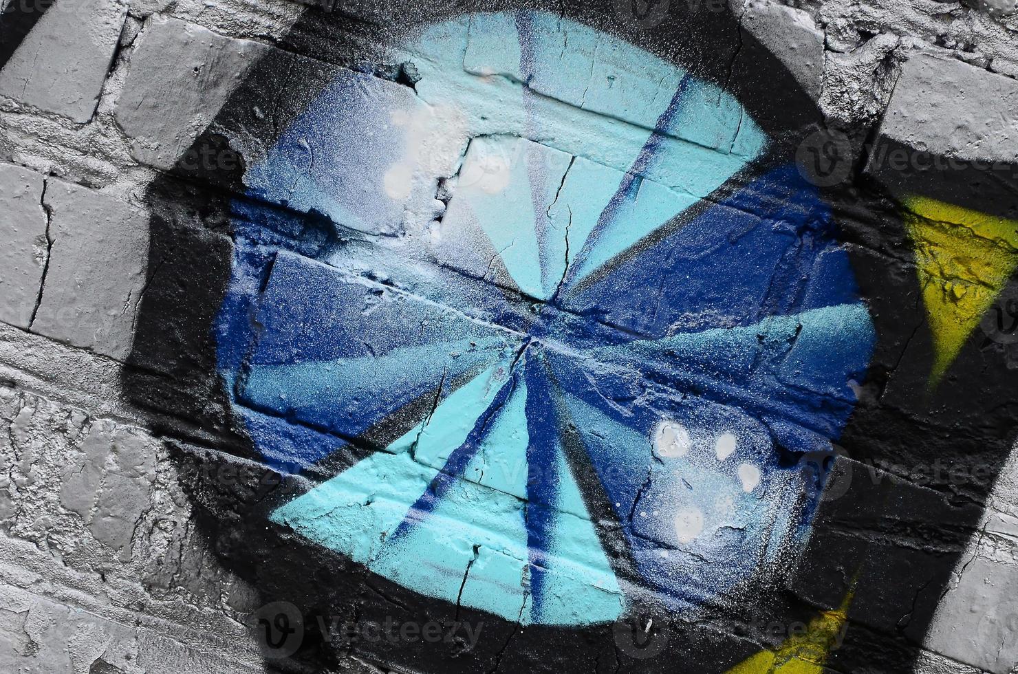 Street art. Abstract background image of a fragment of a colored graffiti painting in chrome and blue tones photo