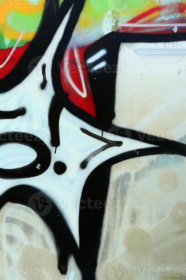 Street art. Abstract background image of a fragment of a colored graffiti painting in chrome and red tones photo