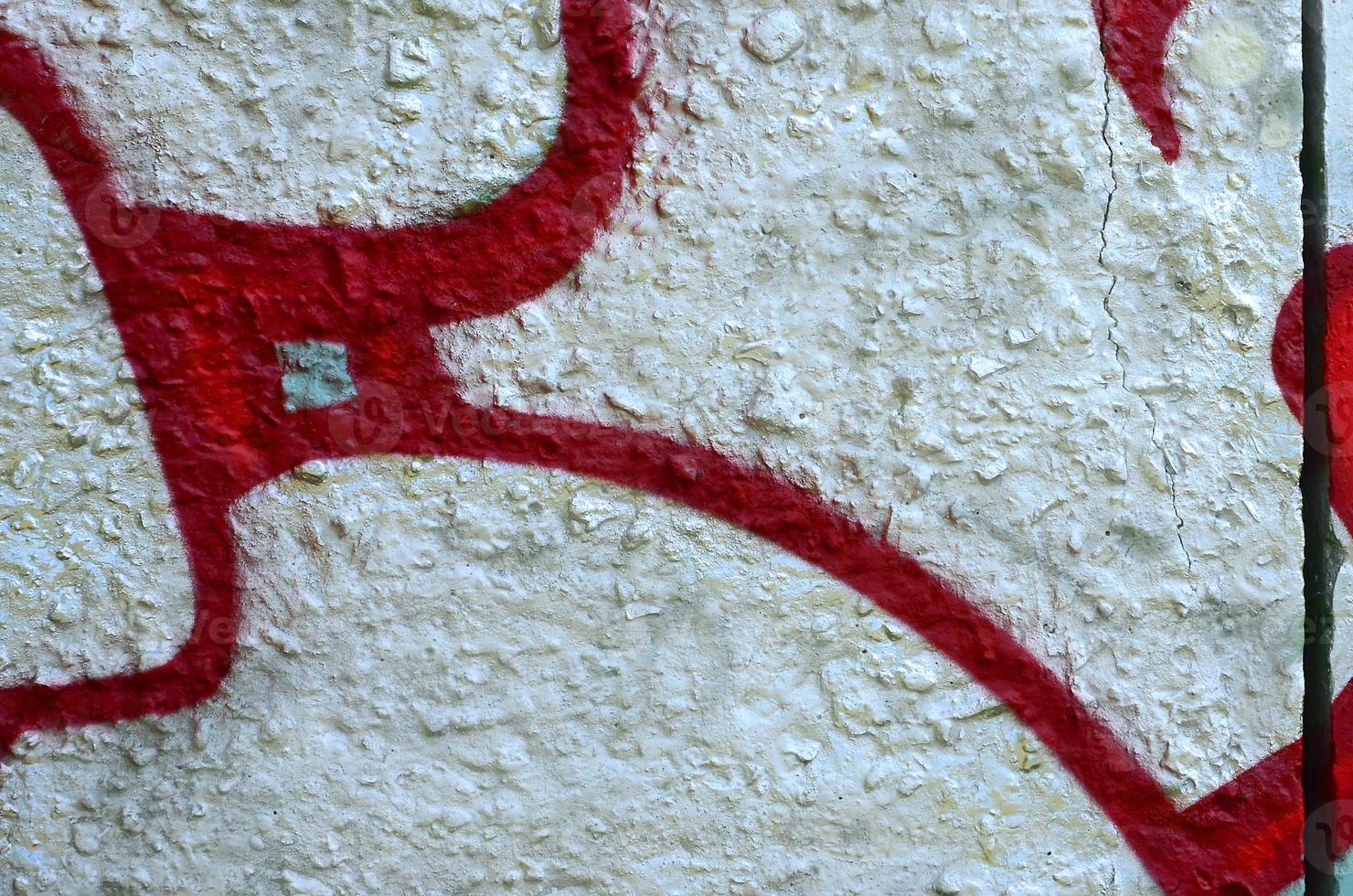 Street art. Abstract background image of a fragment of a colored graffiti painting in chrome and red tones photo