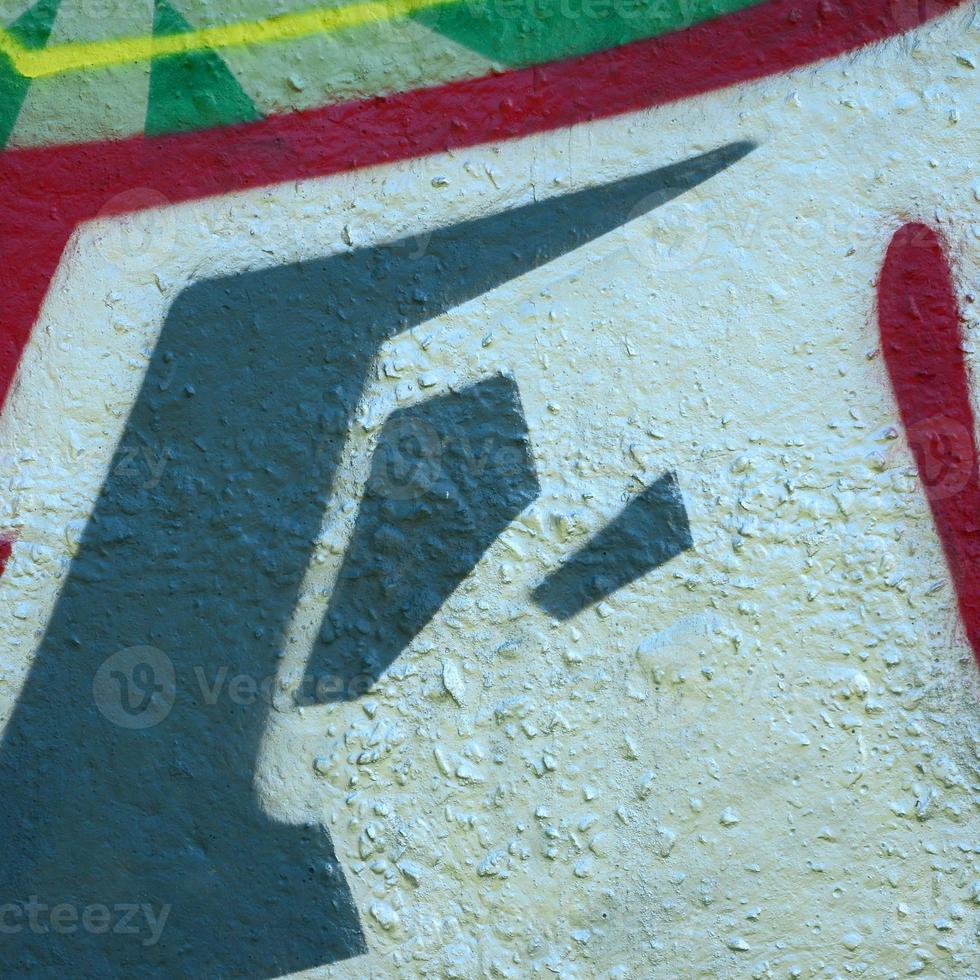 Street art. Abstract background image of a fragment of a colored graffiti painting in chrome and red tones photo