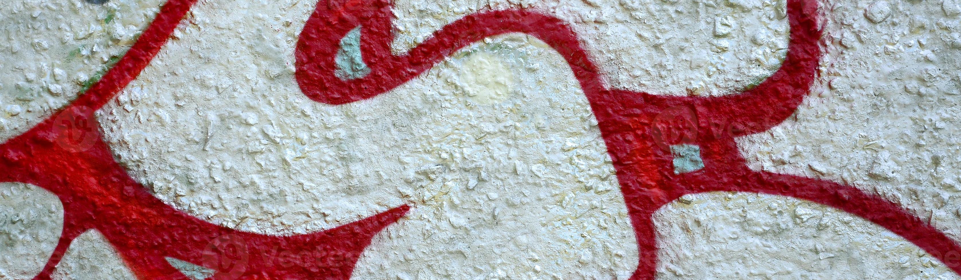 Street art. Abstract background image of a fragment of a colored graffiti painting in chrome and red tones photo