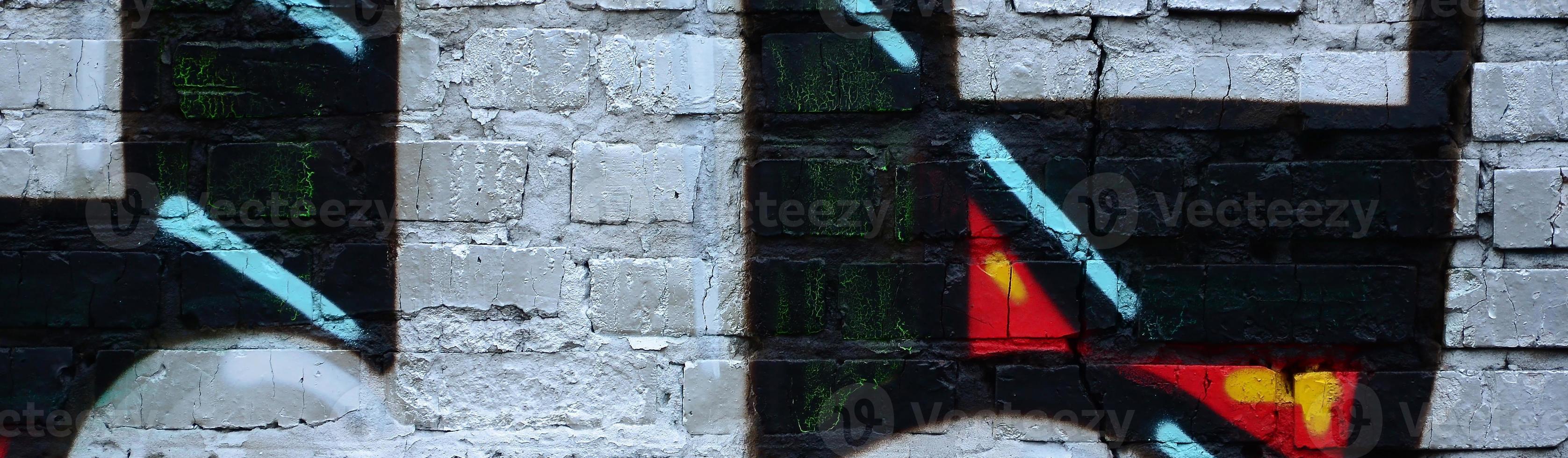 Street art. Abstract background image of a fragment of a colored graffiti painting in chrome and red tones photo
