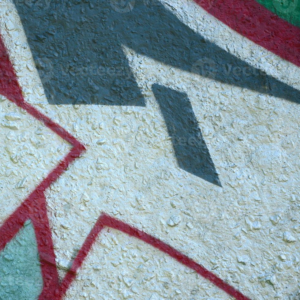 Street art. Abstract background image of a fragment of a colored graffiti painting in chrome and red tones photo