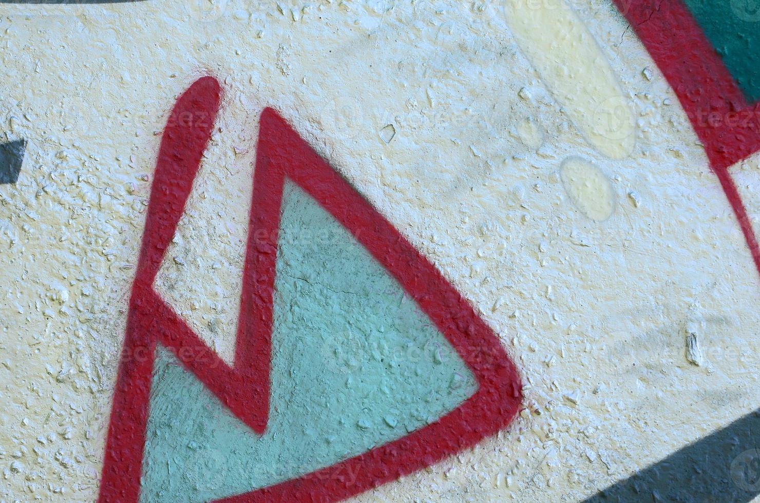 Street art. Abstract background image of a fragment of a colored graffiti painting in chrome and red tones photo