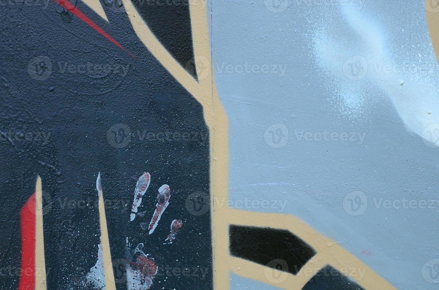 Street art. Abstract background image of a fragment of a colored graffiti painting in dark grey and red tones photo