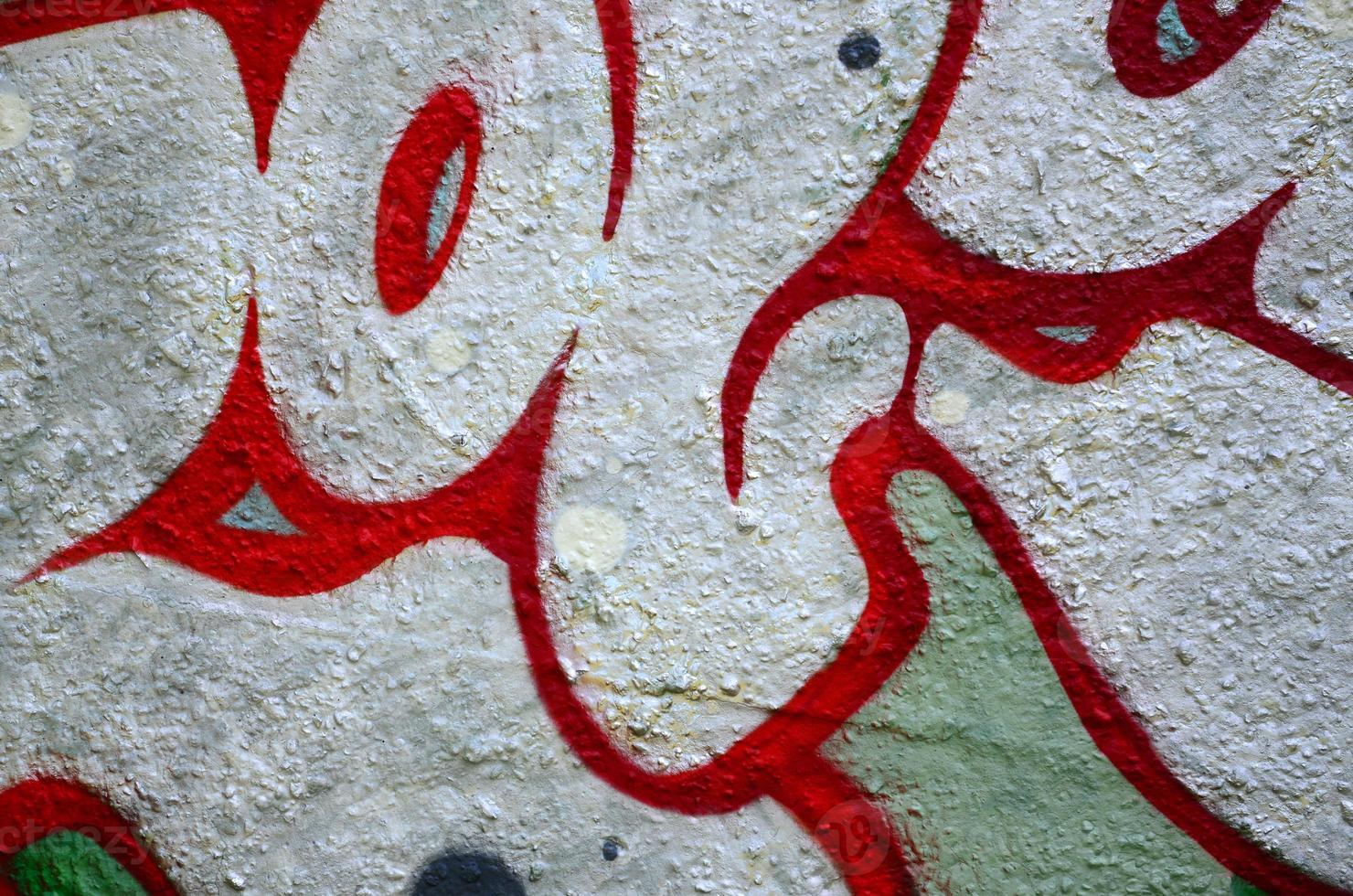 Street art. Abstract background image of a fragment of a colored graffiti painting in chrome and red tones photo