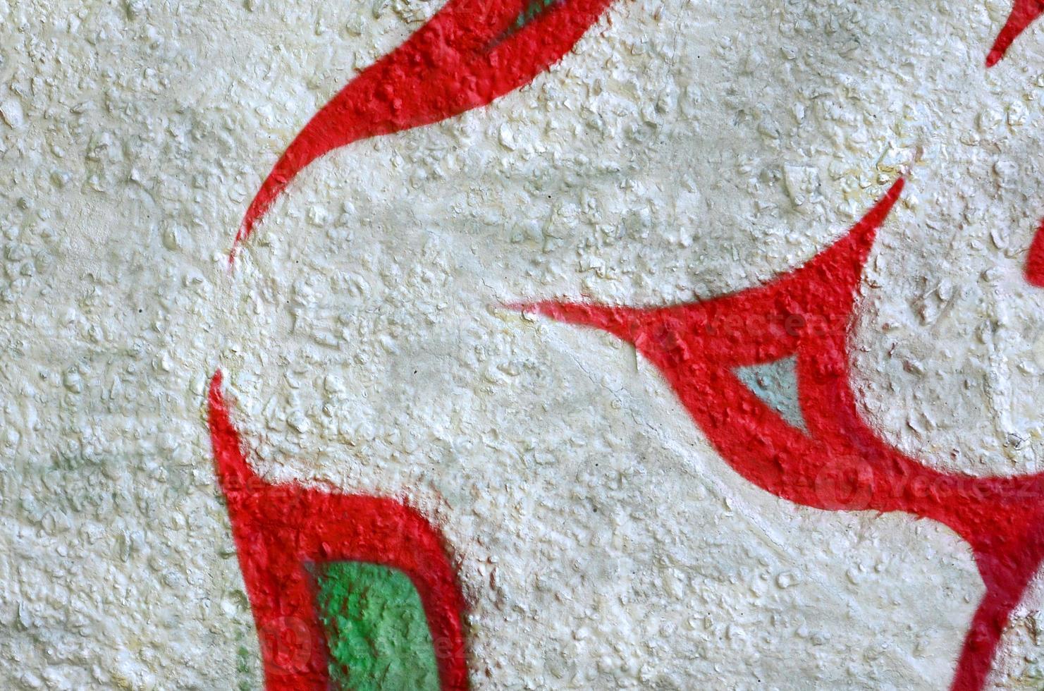 Street art. Abstract background image of a fragment of a colored graffiti painting in chrome and red tones photo