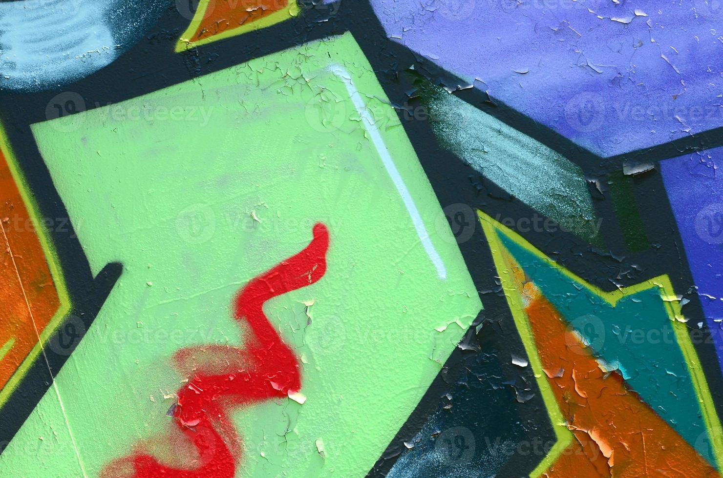 Street art. Abstract background image of a fragment of a colored graffiti painting in khaki green and orange tones photo