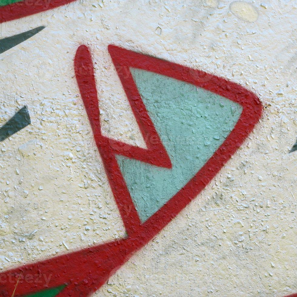 Street art. Abstract background image of a fragment of a colored graffiti painting in chrome and red tones photo