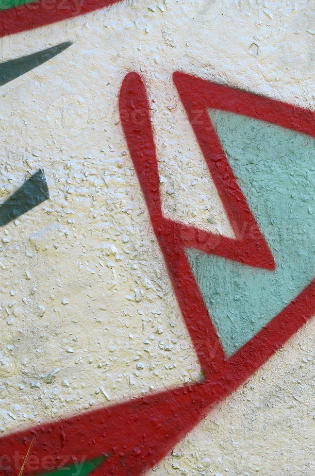 Street art. Abstract background image of a fragment of a colored graffiti painting in chrome and red tones photo