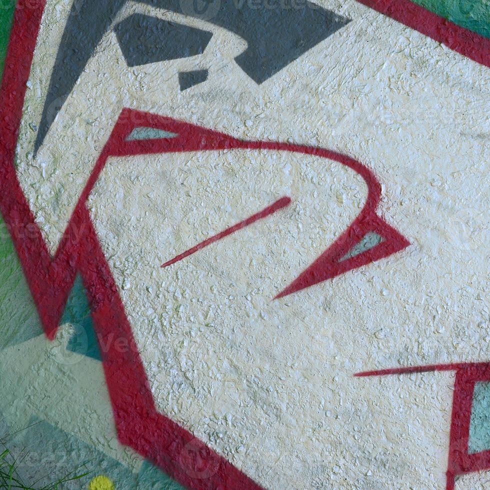 Street art. Abstract background image of a fragment of a colored graffiti painting in chrome and red tones photo