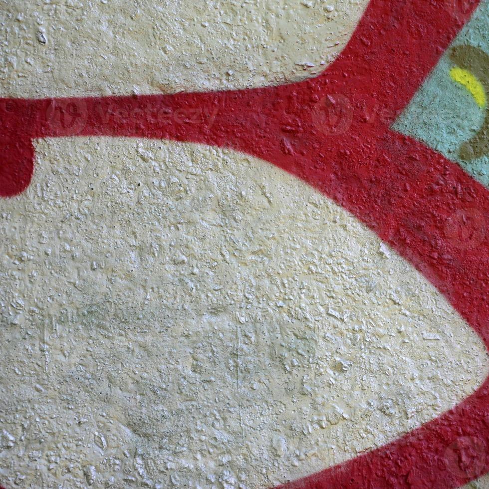Street art. Abstract background image of a fragment of a colored graffiti painting in chrome and red tones photo