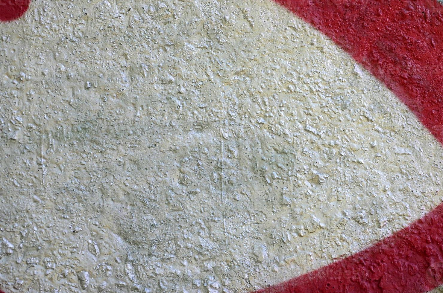 Street art. Abstract background image of a fragment of a colored graffiti painting in chrome and red tones photo