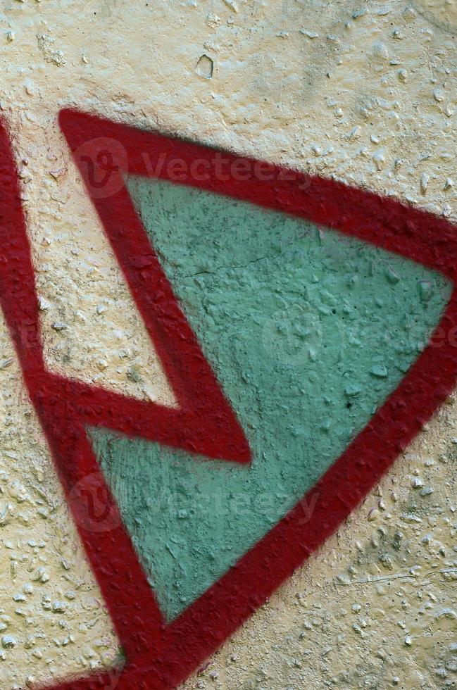 Street art. Abstract background image of a fragment of a colored graffiti painting in chrome and red tones photo